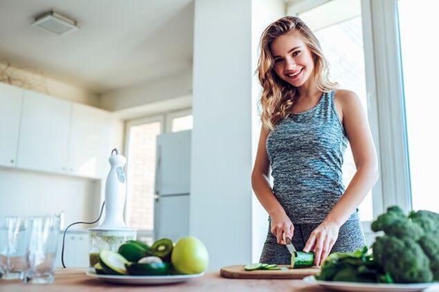 The girl prepares the food according to the principles of diet number 1 for gastritis